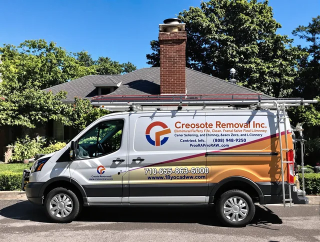 Menifee Chimney Sweep technician removing creosote safely in Menifee, CA